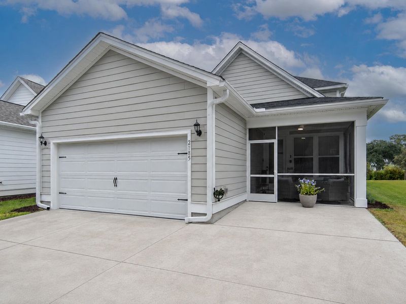 Front exterior of a new home in Twin Lakes, Johns Island, SC, highlighting curb appeal (Image 23).