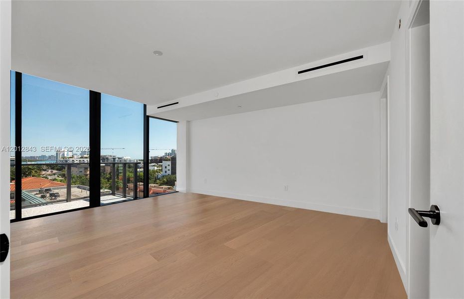 Spacious, unfurnished interior of a new home in , Bay Harbor Islands (Image 21). Spacious, unfurnished interior of a new home in , Bay Harbor Islands (Image 21).
