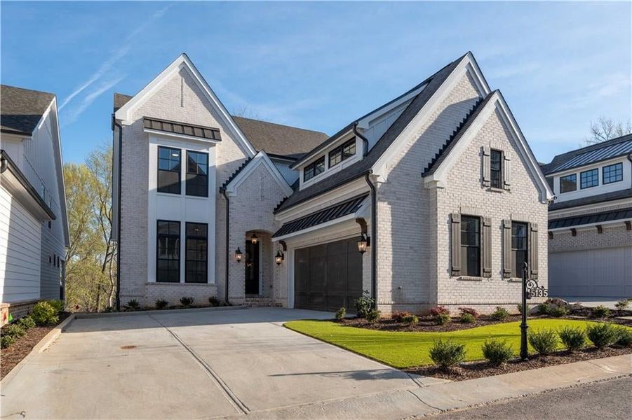 Front exterior of a new home in Waterside Single Family, Peachtree Corners, GA, highlighting curb appeal (Image 2).