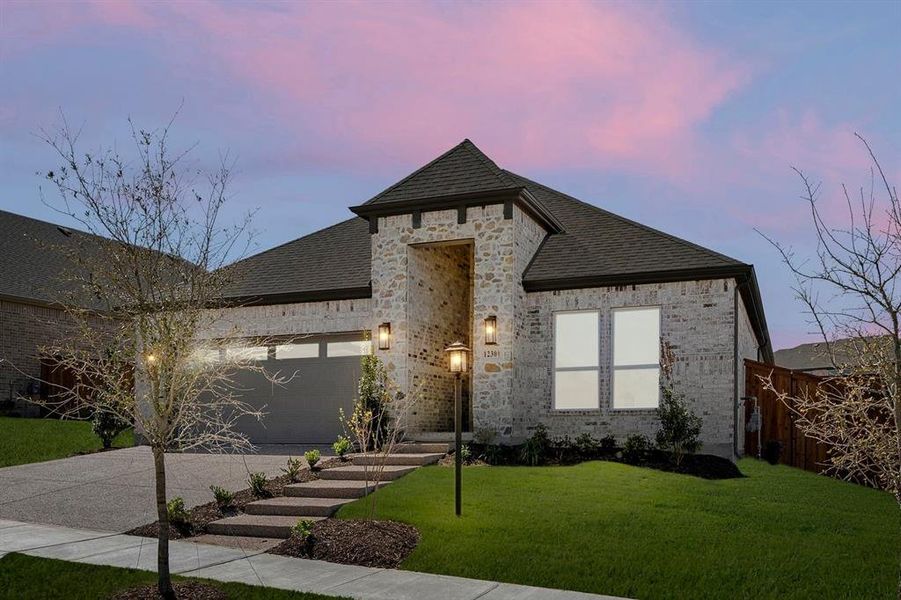 Front exterior of a new home in Inspiration, Lucas, TX, highlighting curb appeal (Image 2). Front exterior of a new home in Inspiration, Lucas, TX, highlighting curb appeal (Image 2).