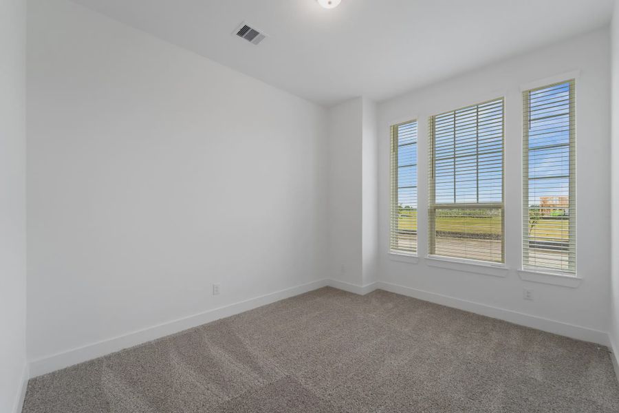 Image 57 representing the Augusta by Chesmar Homes in Riceland Alley Loads, Mont Belvieu, TX.