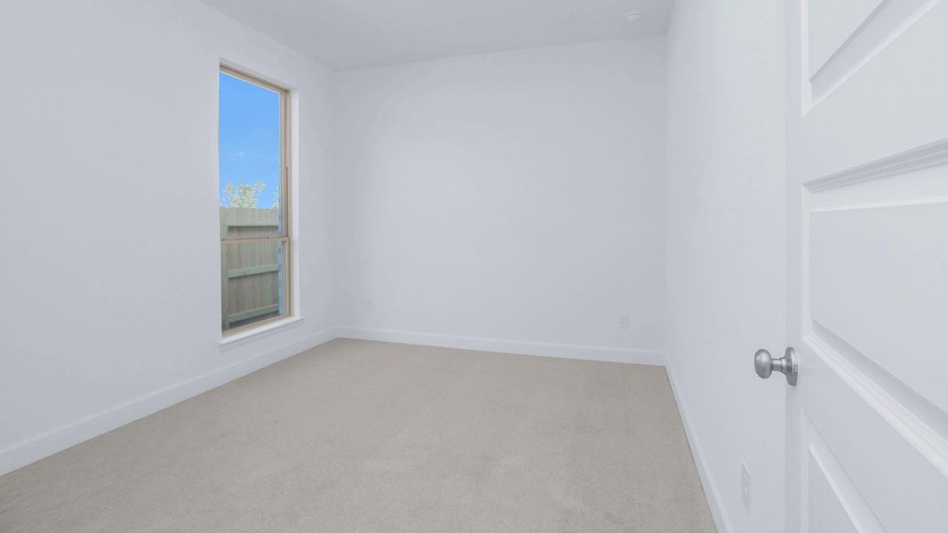 Spacious, unfurnished interior of a new home in Artavia 45', Conroe (Image 11).