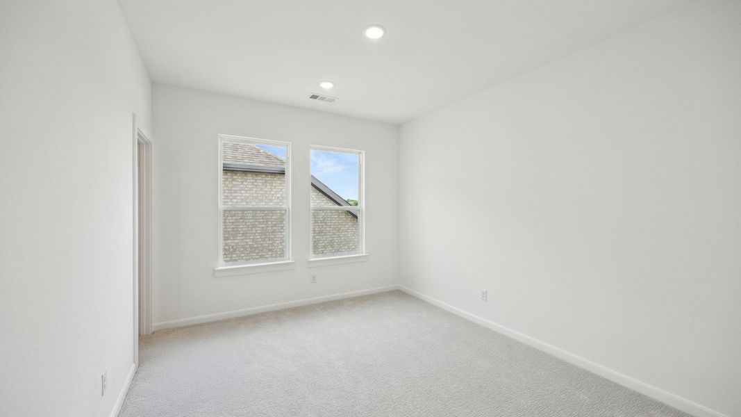 Representative unfurnished interior of a home built from the Royale II by Normandy Homes in Village on Main Street, Frisco (Image 14).