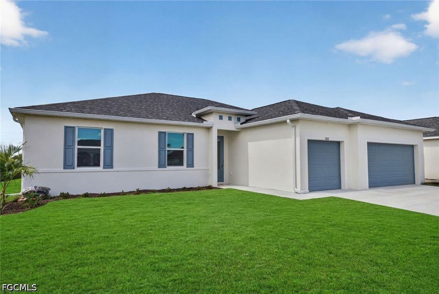 Front exterior of a new home in Cape Coral, Cape Coral, FL, highlighting curb appeal (Image 2). Front exterior of a new home in Cape Coral, Cape Coral, FL, highlighting curb appeal (Image 2).
