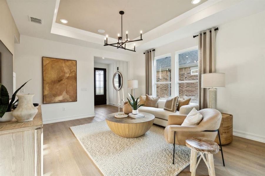 *Model Representation - Gathering room with view of main living areas