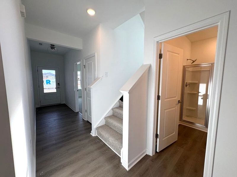 Foyer featuring the AW Collection® Timeless - A refined welcome with soft light and style.