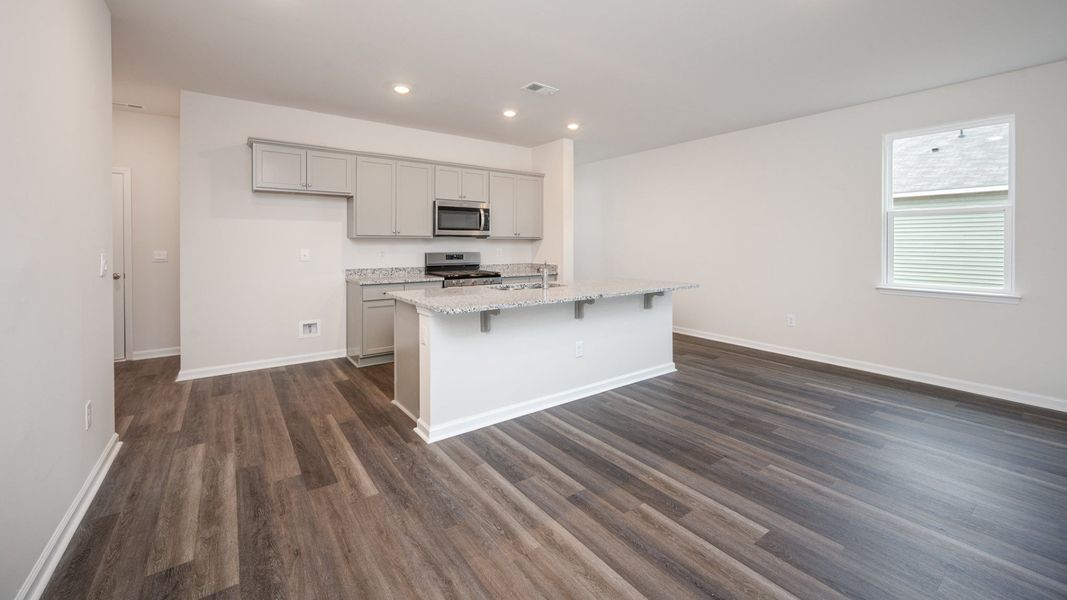 Representative furnished interior of a home built from the WREN by D.R. Horton in Sidbury Station, Castle Hayne (Image 8).