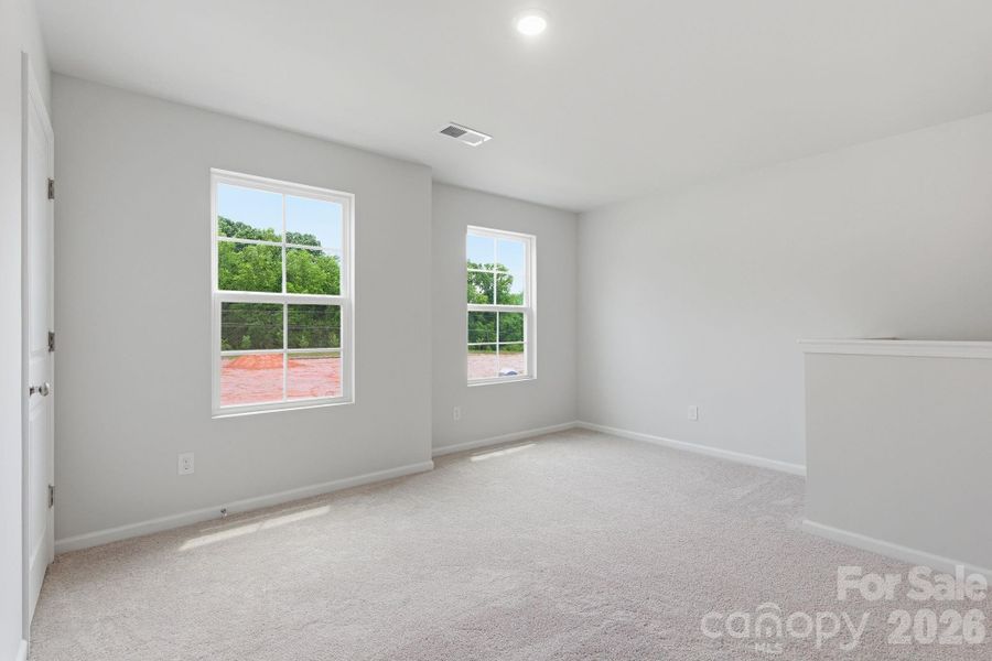 Spacious, unfurnished interior of a new home in Piper Creek, Newton (Image 27).