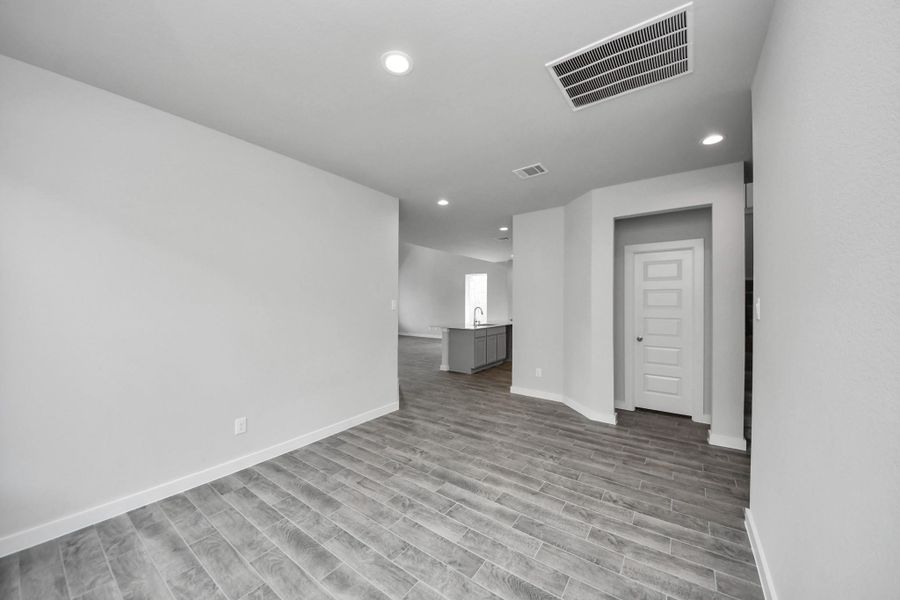 Make memories gathered around the table with your family and friends! This spacious dining room features elegant flooring, custom paint, and adjacent to family room and kitchen for open concept feel. Make memories gathered around the table with your family and friends! This spacious dining room features elegant flooring, custom paint, and adjacent to family room and kitchen for open concept feel.