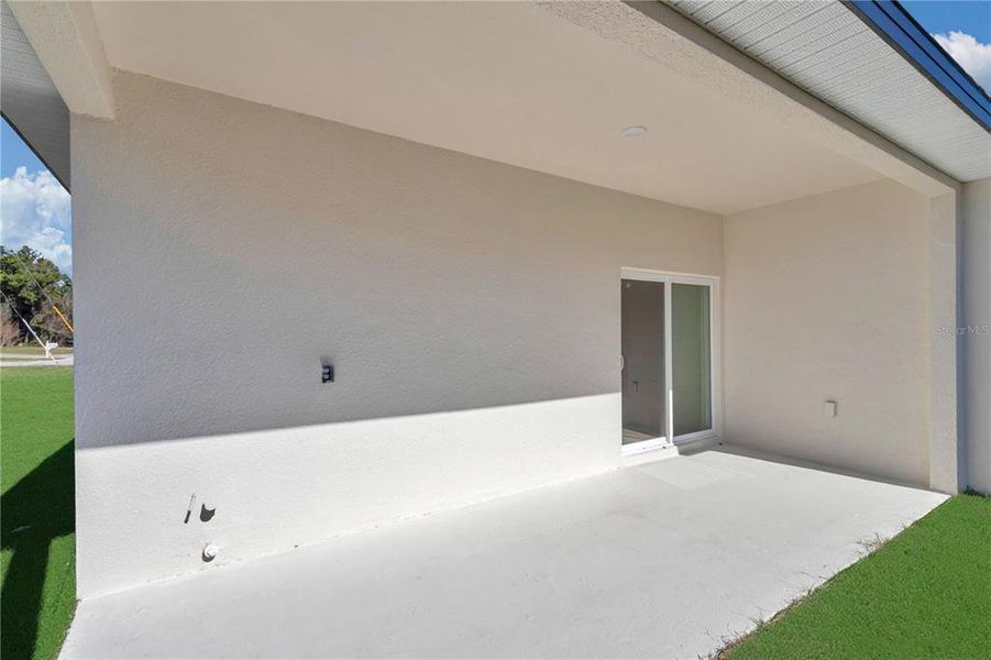 Exterior details and patio area of a home in , Ocala (Image 3).