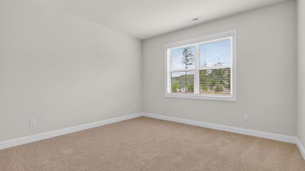 Spacious, unfurnished interior of a new home in The Manors at Haywood Glen, Knightdale (Image 13).