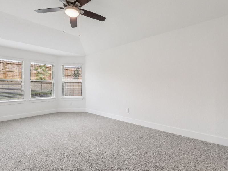 Primary bedroom in the Callaghan floorplan at a Meritage Homes community.