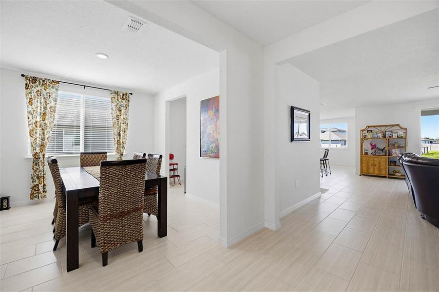 Furnished interior view inside a new home in The Grove at Stuart Crossing - Signature Series, Bartow (Image 8). Furnished interior view inside a new home in The Grove at Stuart Crossing - Signature Series, Bartow (Image 8).