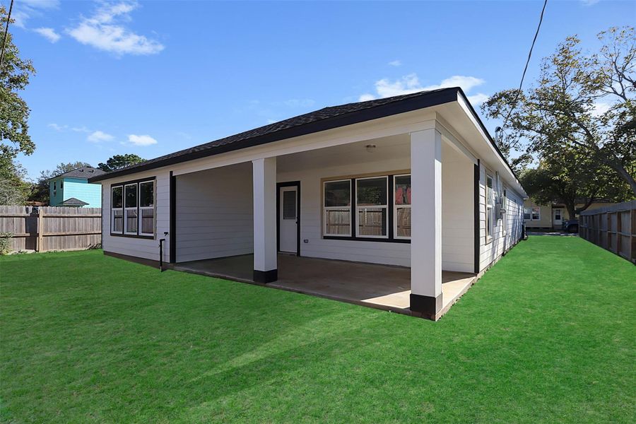 Backyard **Grass in photos has been digitally enhanced for visual representation.