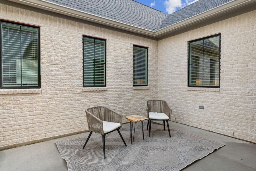 Exterior details and patio area of a home in , Bryan (Image 3).