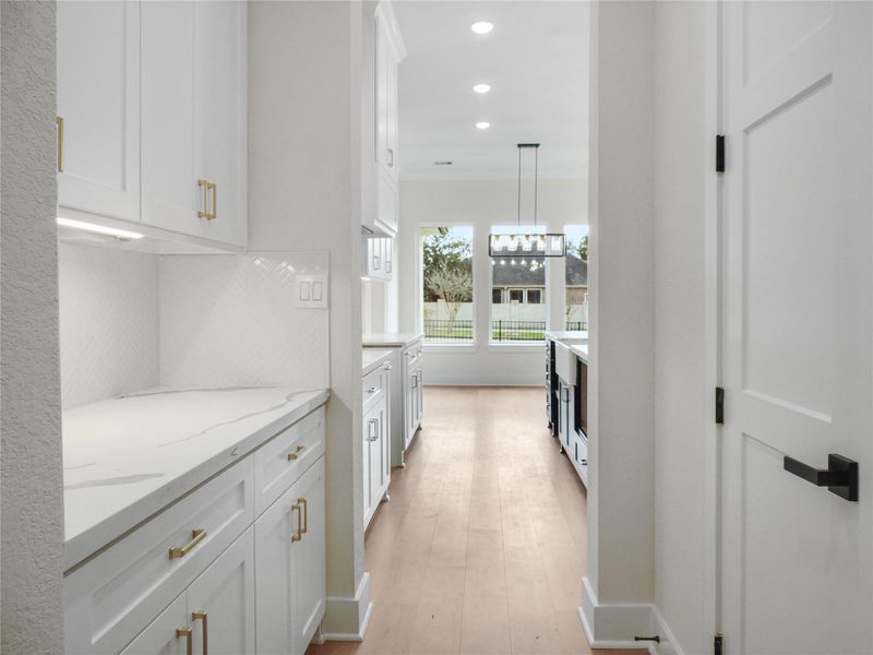 Other Pictures of a Butler's pantry built by Texas best home builders