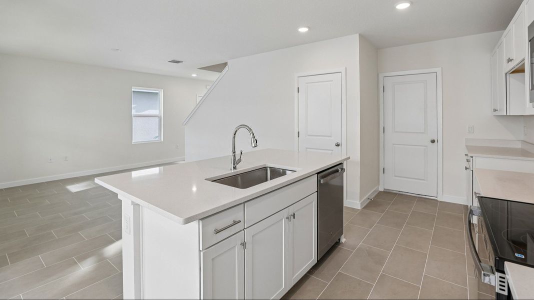 Furnished interior view inside a new home in Cyrene at Harmony, St. Cloud (Image 11).