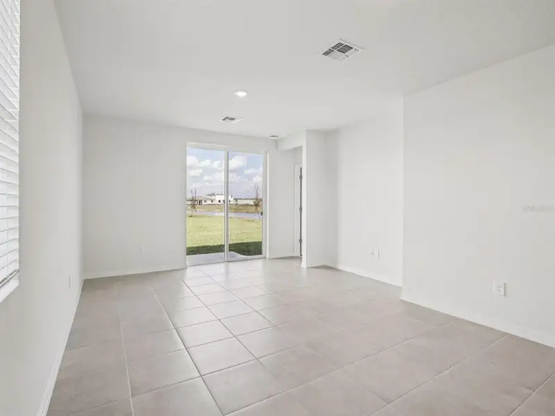 Spacious, unfurnished interior of a new home in Magnolia Bay - Premier Series, Nokomis (Image 11).