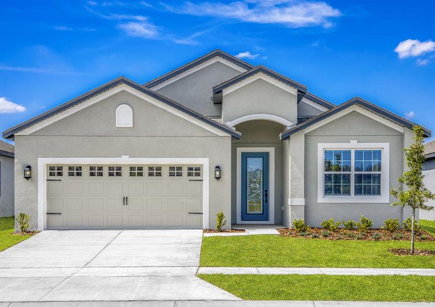 Beautiful lush landscaping throughout the front yard