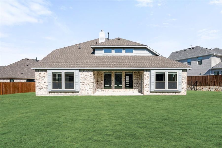 Exterior details and patio area of a home in The Enclave at Parks of Aledo, Aledo (Image 4). Exterior details and patio area of a home in The Enclave at Parks of Aledo, Aledo (Image 4).
