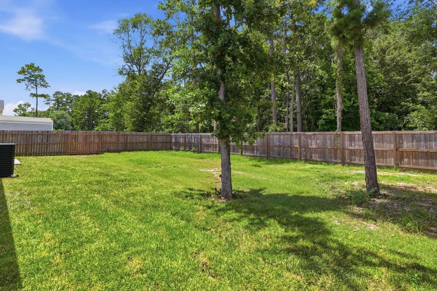 Exterior details and patio area of a home in , Conroe (Image 19). Exterior details and patio area of a home in , Conroe (Image 19).