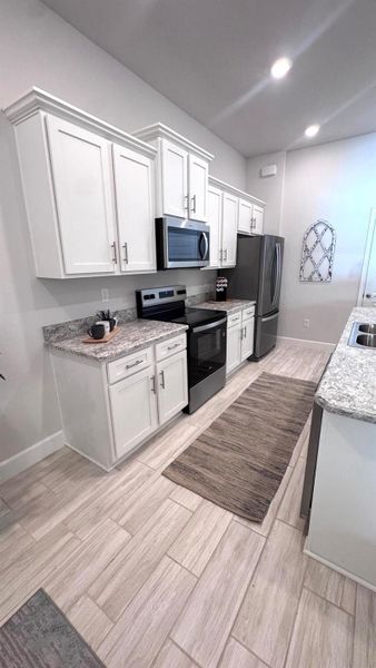 Furnished interior view inside a new home in Waterstone Villas, Fort Pierce (Image 7).