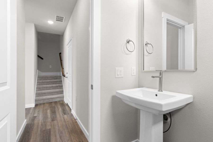 Furnished interior view inside a new home in The Tribute, The Colony (Image 14).