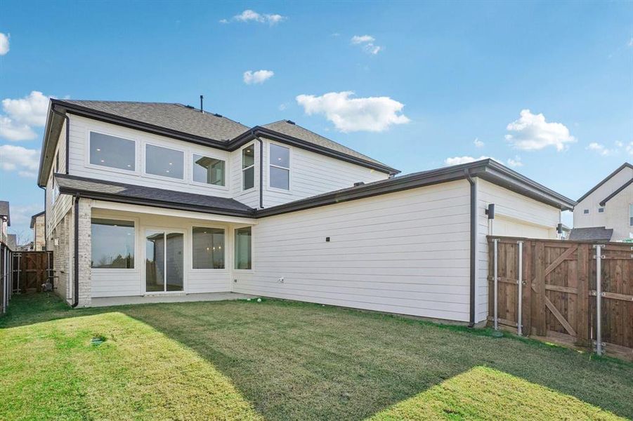 Exterior details and patio area of a home in , Rowlett (Image 23).