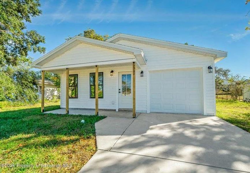 Exterior details and patio area of a home in , Spring Hill (Image 3). Exterior details and patio area of a home in , Spring Hill (Image 3).