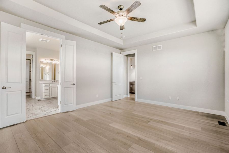 Spacious, unfurnished interior of a new home in RainDance, Windsor (Image 35).