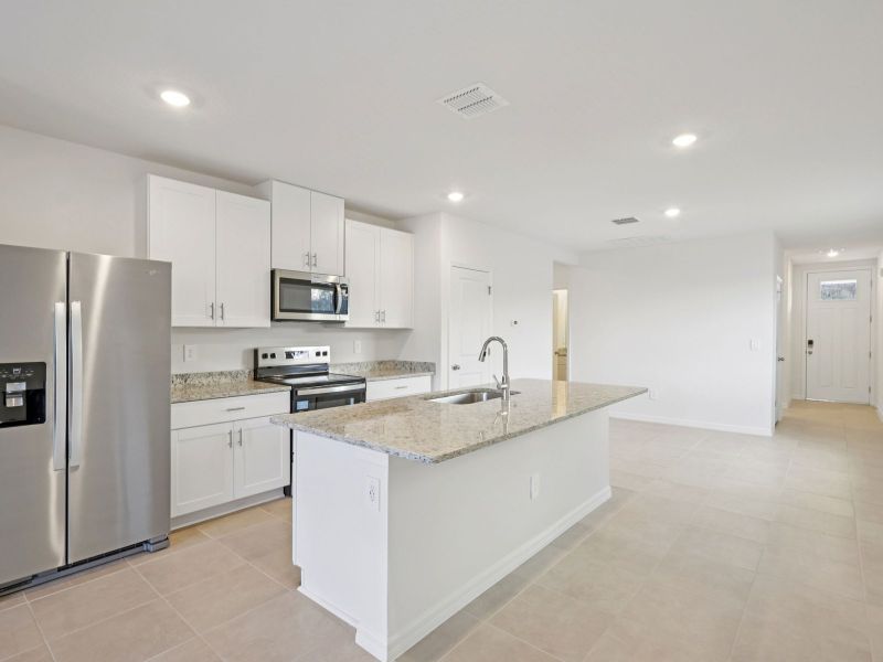 Furnished interior view inside a new home in Salt Meadows - Premier Series, Parrish (Image 3).