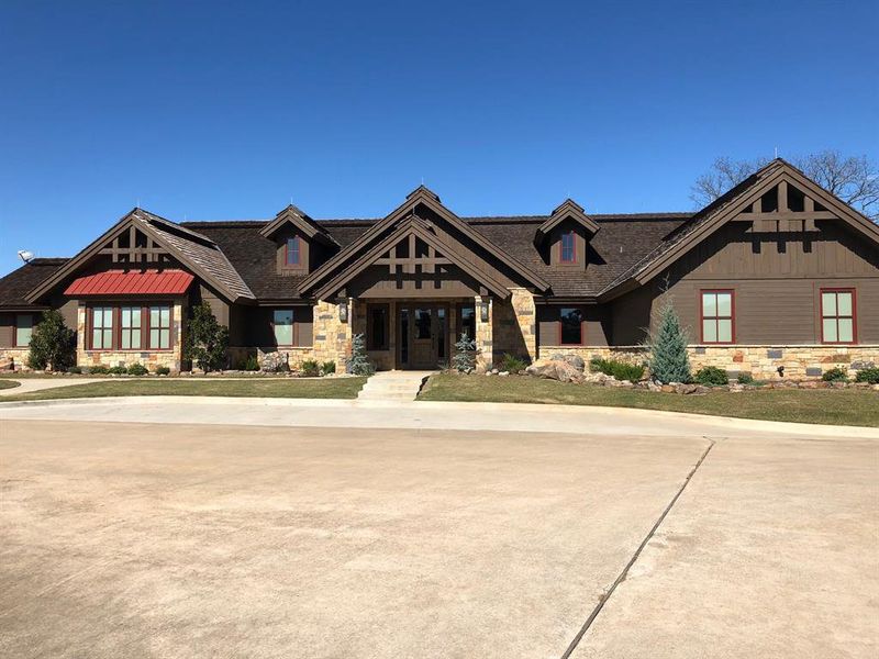 Front exterior of a new home in , Gordonville, TX, highlighting curb appeal (Image 20). Front exterior of a new home in , Gordonville, TX, highlighting curb appeal (Image 20).