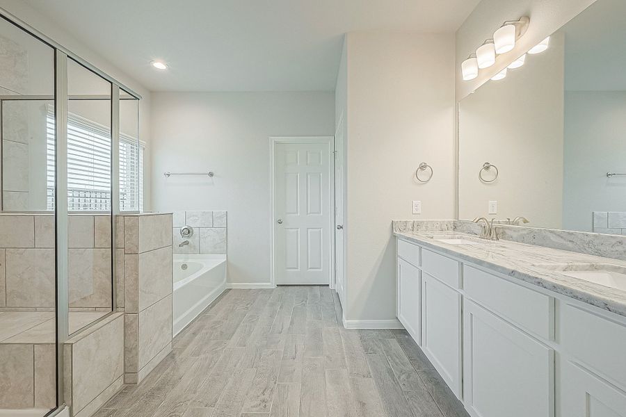 Representative furnished interior of a home built from the Floor Plan 2050 by Colina Homes in Grand Magnolia, Magnolia (Image 6).