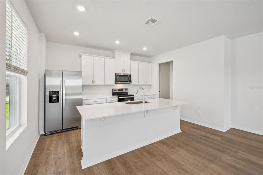 Furnished interior view inside a new home in The Meadow at Crossprairie Bungalows, St. Cloud (Image 14).