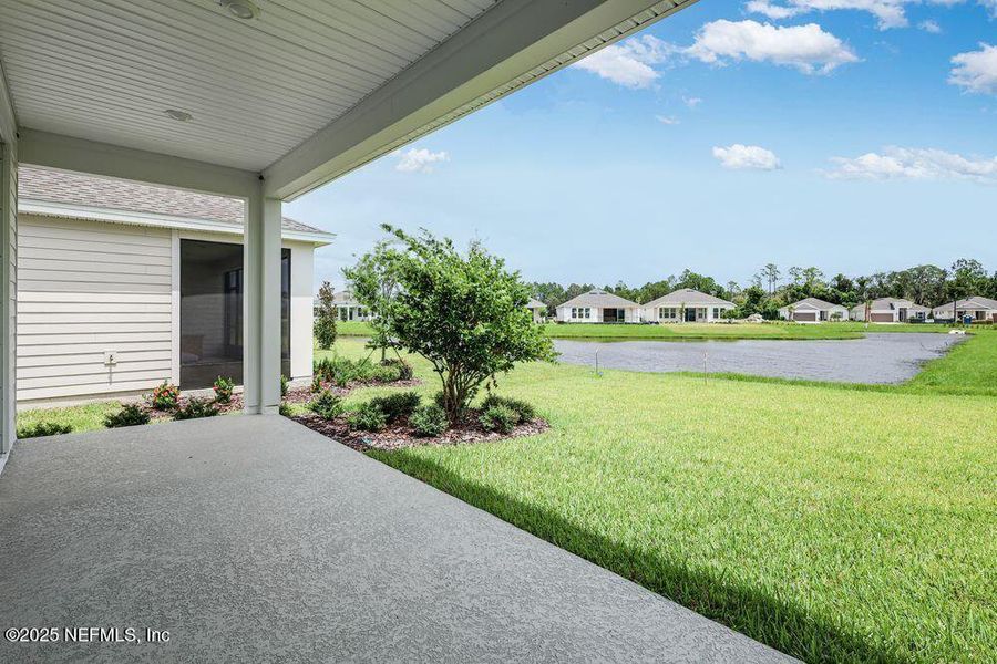 Front exterior of a new home in Colbert Landings, Palm Coast, FL, highlighting curb appeal (Image 18).