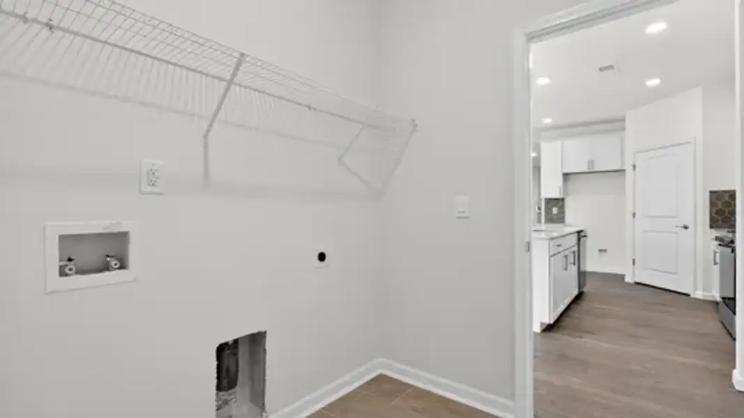 Spacious, unfurnished interior of a new home in The Villas at Galvins Ridge, Sanford (Image 28).