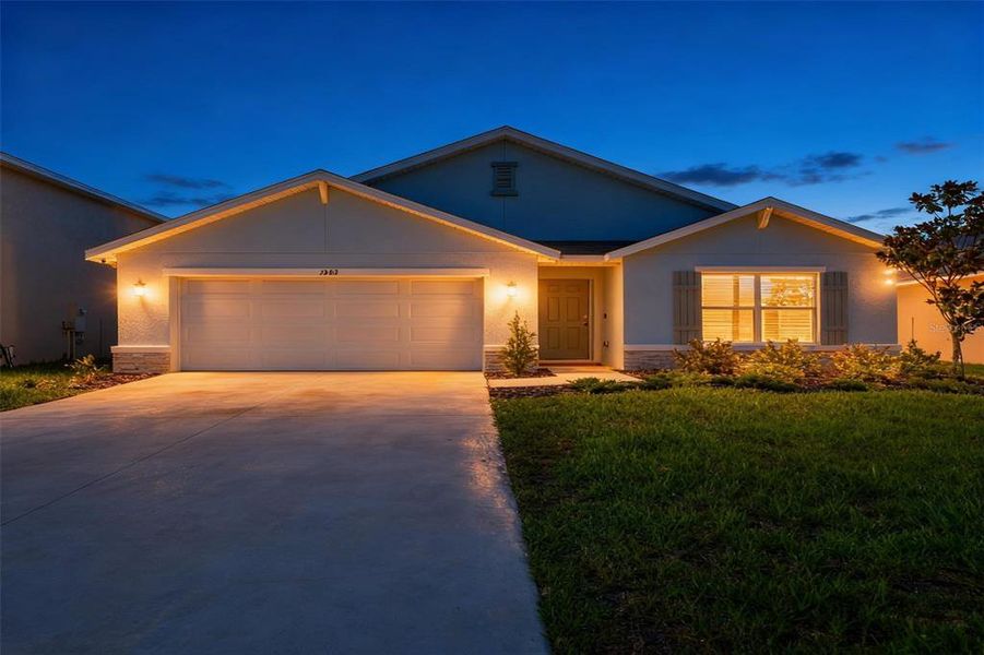 Front exterior of a new home in North Park Isle, Plant City, FL, highlighting curb appeal (Image 2). Front exterior of a new home in North Park Isle, Plant City, FL, highlighting curb appeal (Image 2).