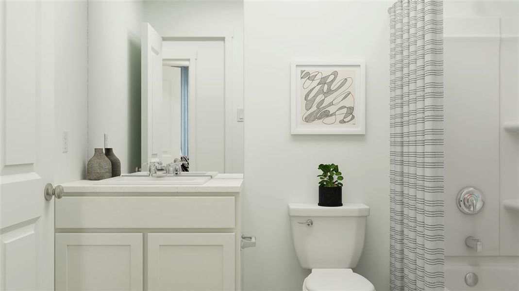 Full bathroom featuring vanity, toilet, and shower / bathtub combination with curtain