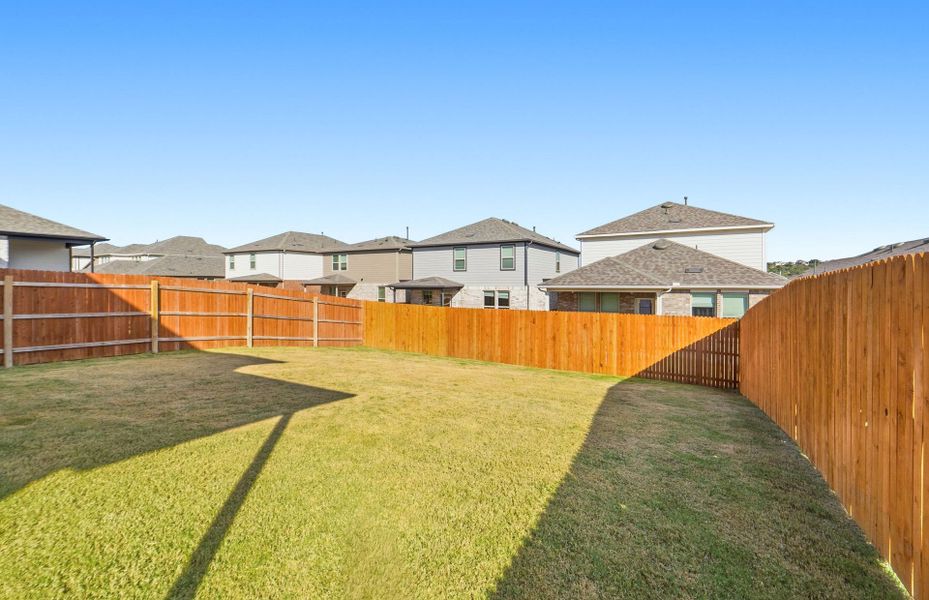 Exterior details and patio area of a home in Saddleback at Santa Rita Ranch, Liberty Hill (Image 3).