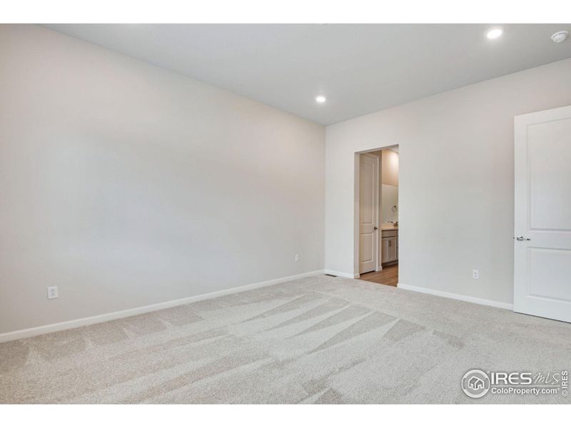 Spacious, unfurnished interior of a new home in Westside Crossing Paired Homes, Berthoud (Image 21).