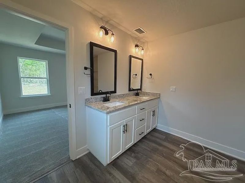 Furnished interior view inside a new home in Turtle Creek, Cantonment (Image 4).