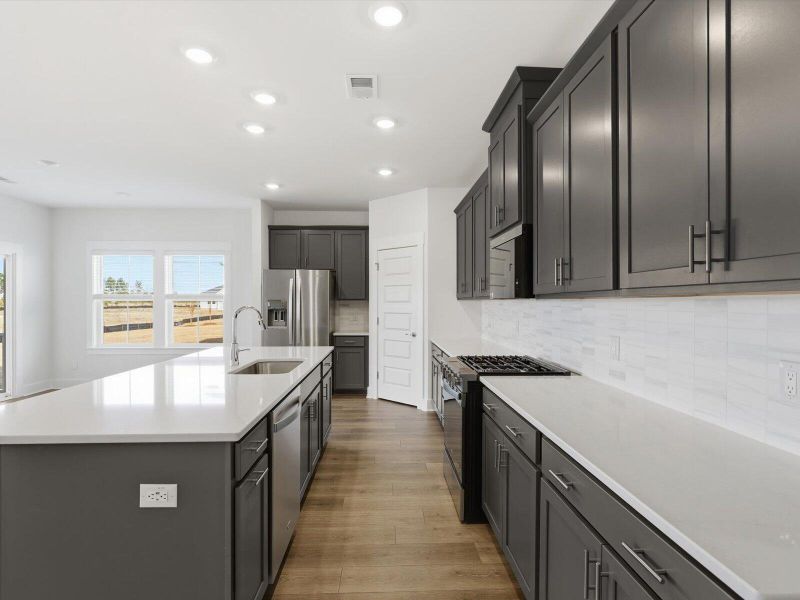 Furnished interior view inside a new home in The Coves at Lakes of Cane Bay, Summerville (Image 11).