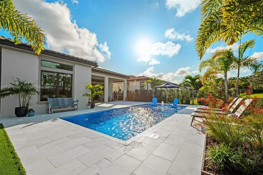 Exterior details and patio area of a home in , Parkland (Image 3).