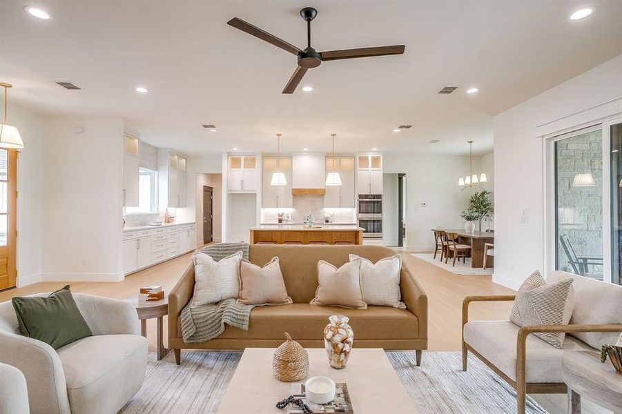 Main living area that opens to kitchen & dining