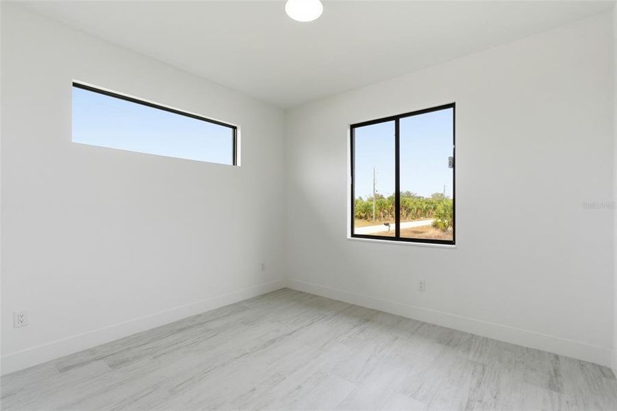 Spacious, unfurnished interior of a new home in , Port Charlotte (Image 29).
