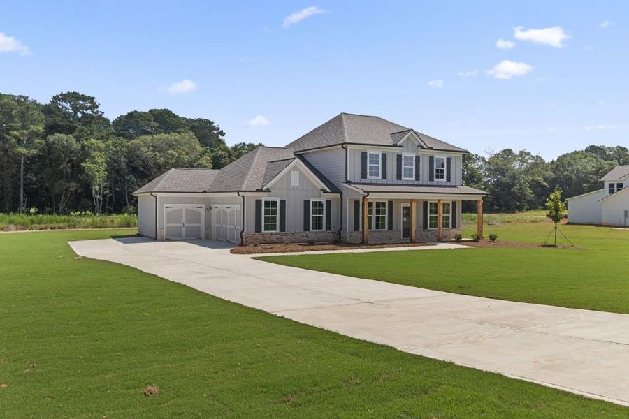 Front exterior of a new home in , Good Hope, GA, highlighting curb appeal (Image 2). Front exterior of a new home in , Good Hope, GA, highlighting curb appeal (Image 2).
