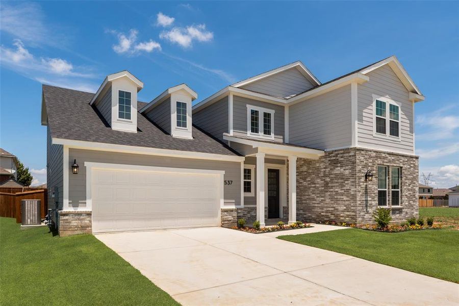 Front exterior of a new home in Creekside of Crowley, Crowley, TX, highlighting curb appeal (Image 2).