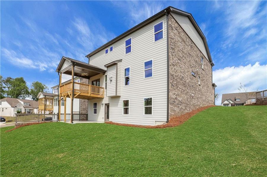 Exterior details and patio area of a home in Cambridge, Flowery Branch (Image 3).
