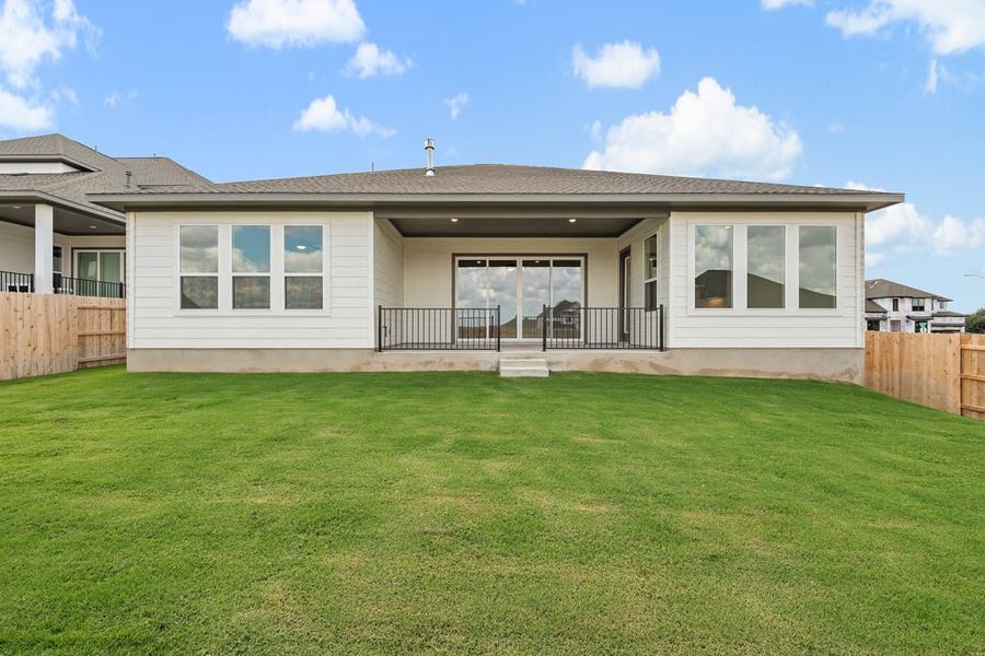 Exterior details and patio area of a home in Capitol Collection at Lariat, Liberty Hill (Image 19). Exterior details and patio area of a home in Capitol Collection at Lariat, Liberty Hill (Image 19).