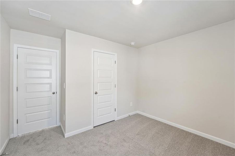 Spacious, unfurnished interior of a new home in Hemingway - Reserve Series, Cumming (Image 55).